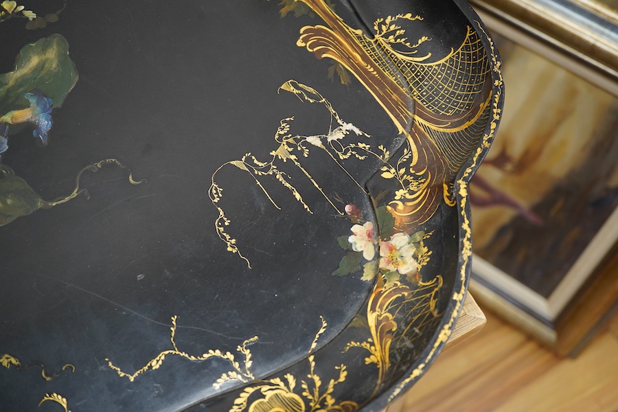 A large Victorian papier maché painted and gilt tray, 79cm wide